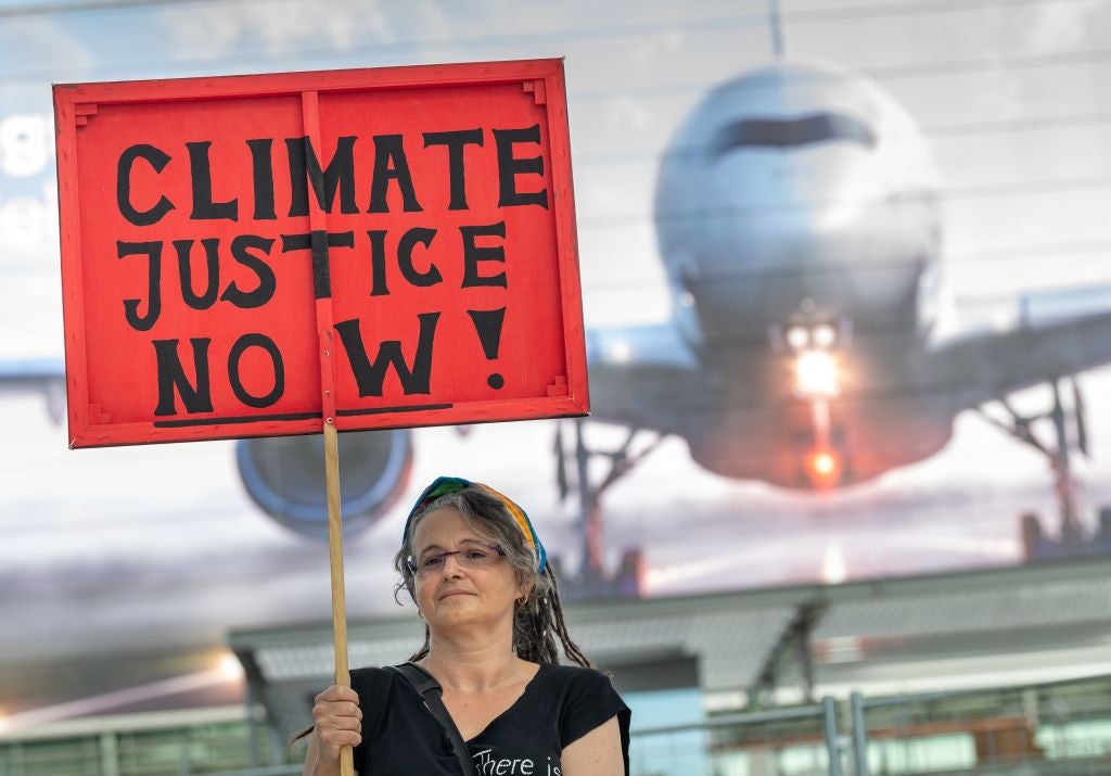 climate protester at Munich Airport.