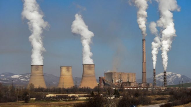 smoke stacks at a thermal power plant